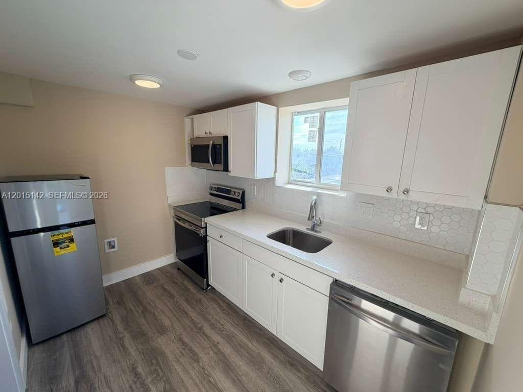 943 79th Ter # 202, Miami Beach FL 33141 — 5