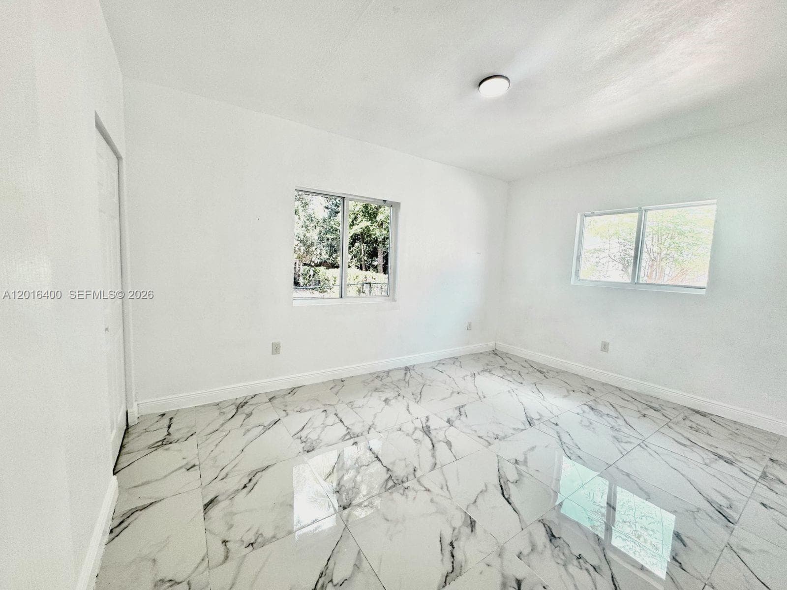 7703 NW 3rd Ave, Miami FL 33150 — 9