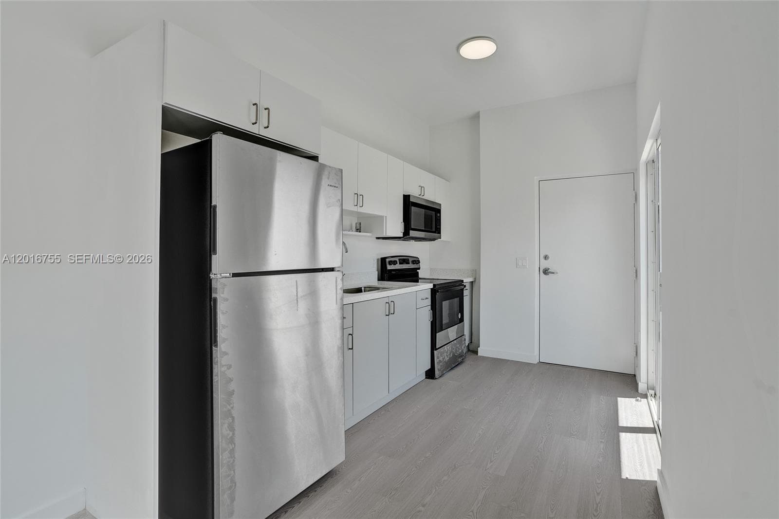 1567 NW 1st St # 8, Miami FL 33125 — 3