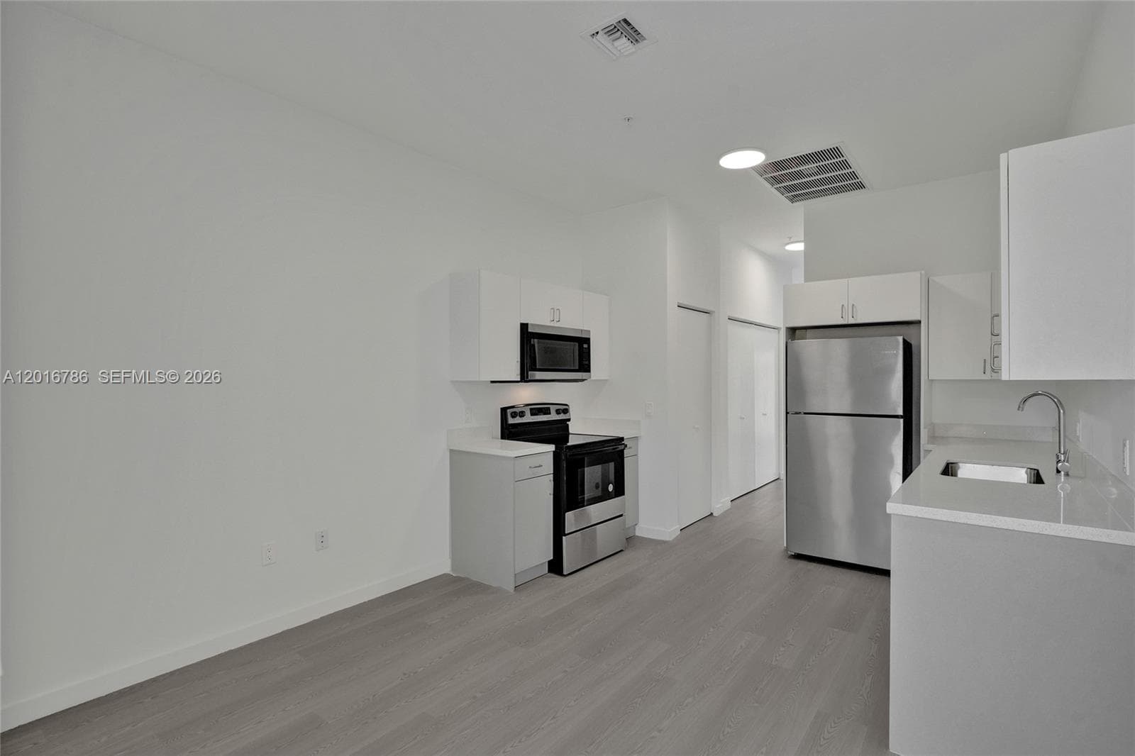 1567 NW 1st St # 9, Miami FL 33125 — 3