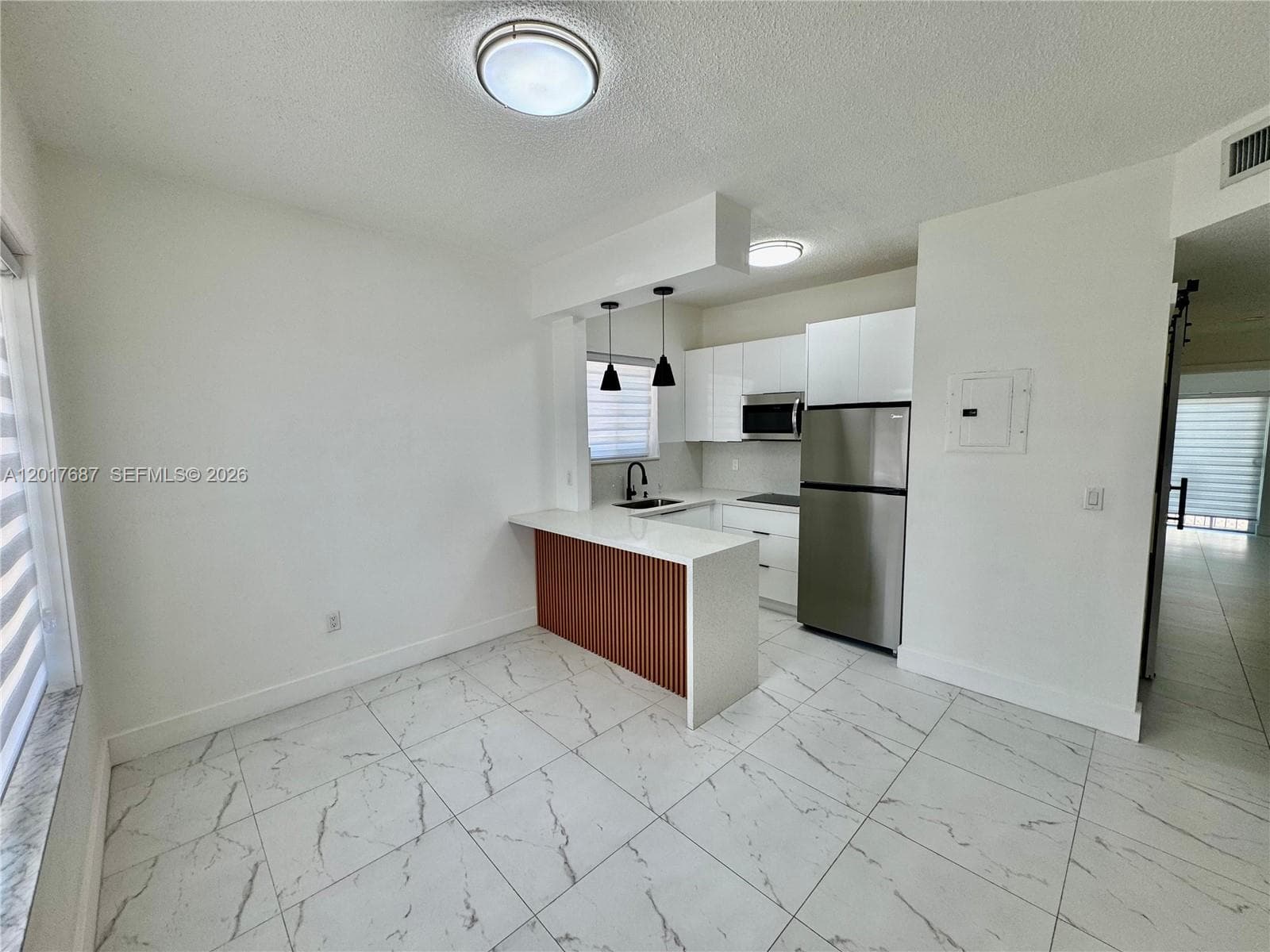 421 NW 13th Ave # A, Miami FL 33125 — 2