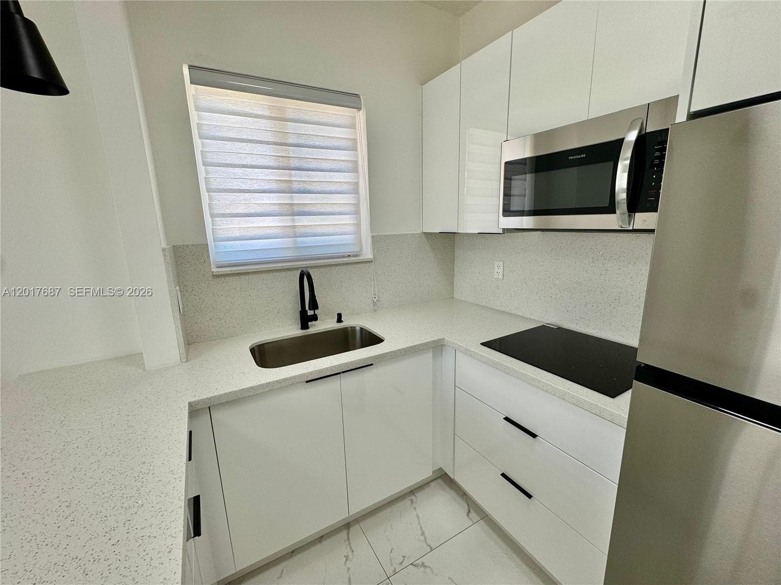 421 NW 13th Ave # A, Miami FL 33125 — 3