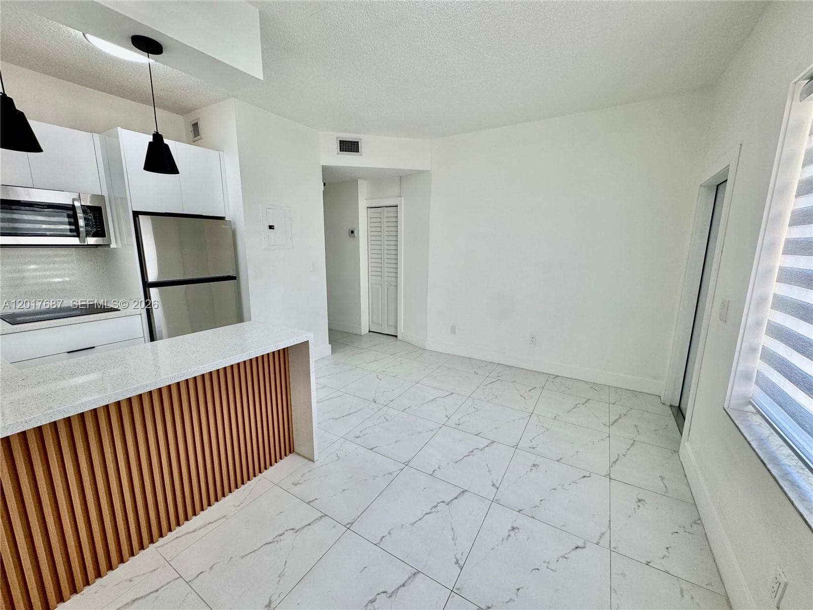 421 NW 13th Ave # A, Miami FL 33125 — 1