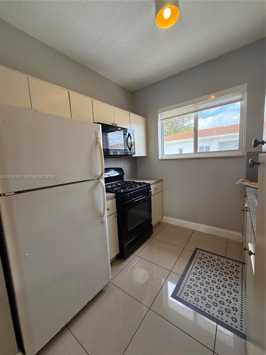 7710 Harding Ave # 1, Miami Beach FL 33141 — 9