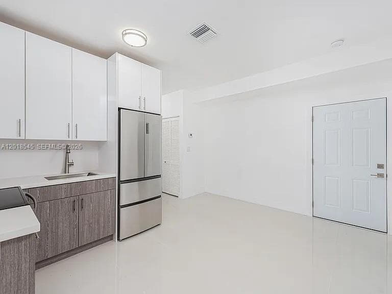 676 NW 47th St # 2, Miami FL 33127 — 3
