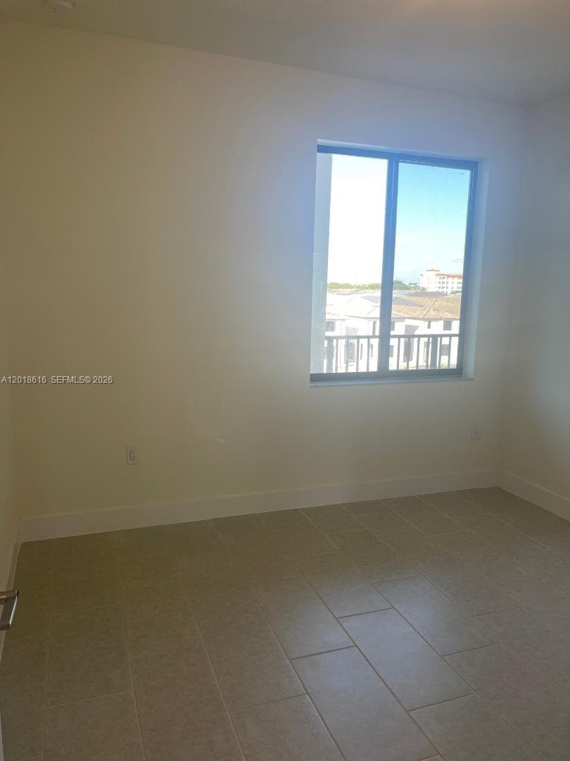 8167 NW 41 St # 407, Doral FL 33166 — 5