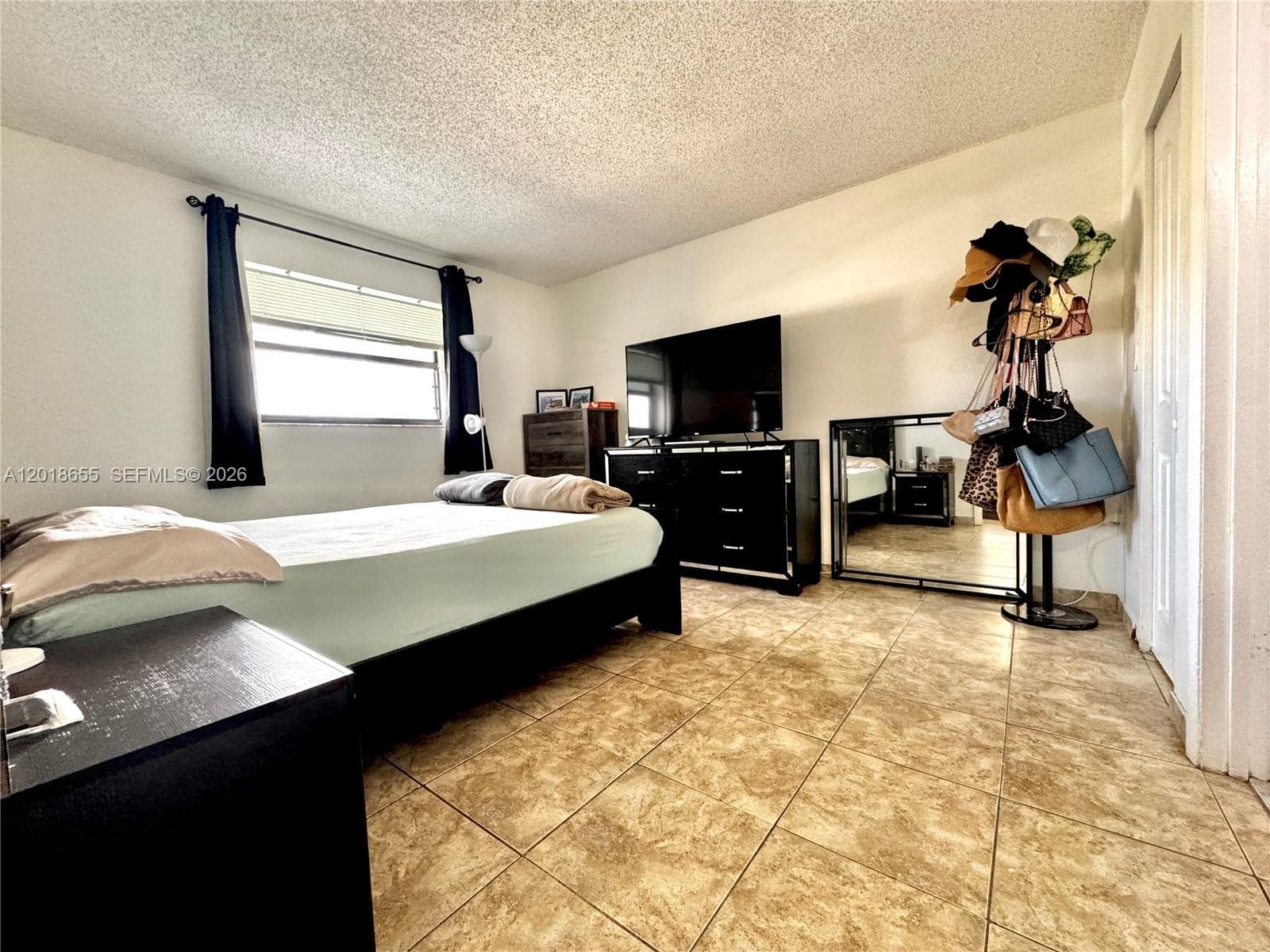 8145 NW 7th St # 404, Miami FL 33126 — 8