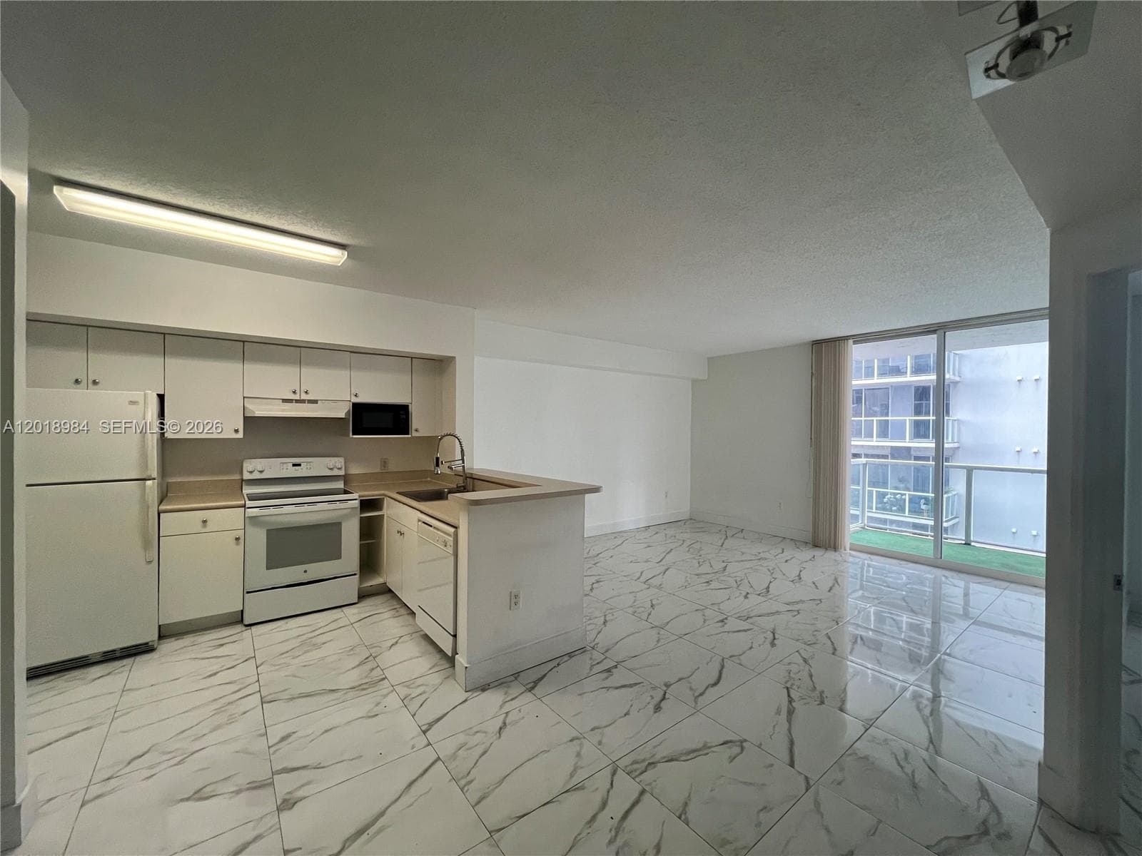 5085 NW 7th St # 711, Miami FL 33126 — 2
