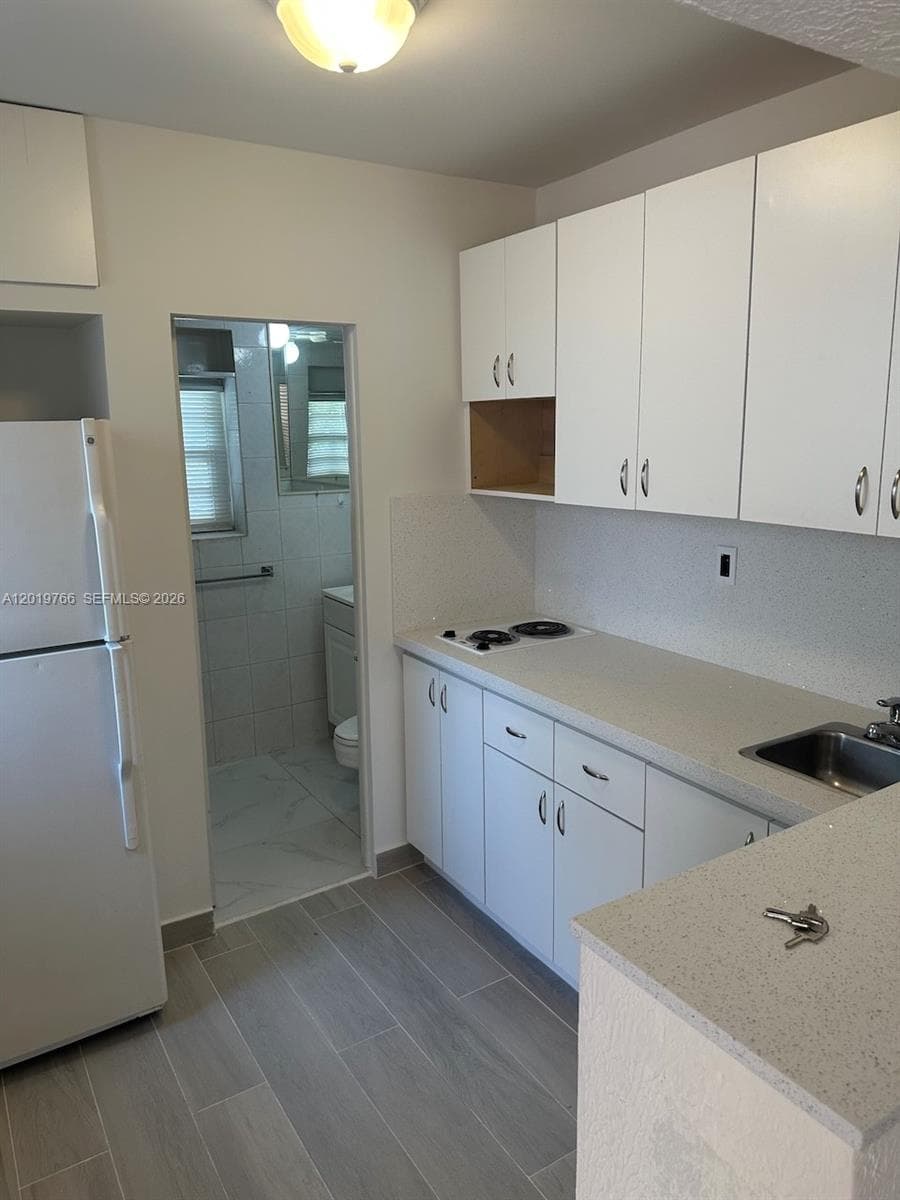 450 NW 40th ct, Miami FL 33126 — 32