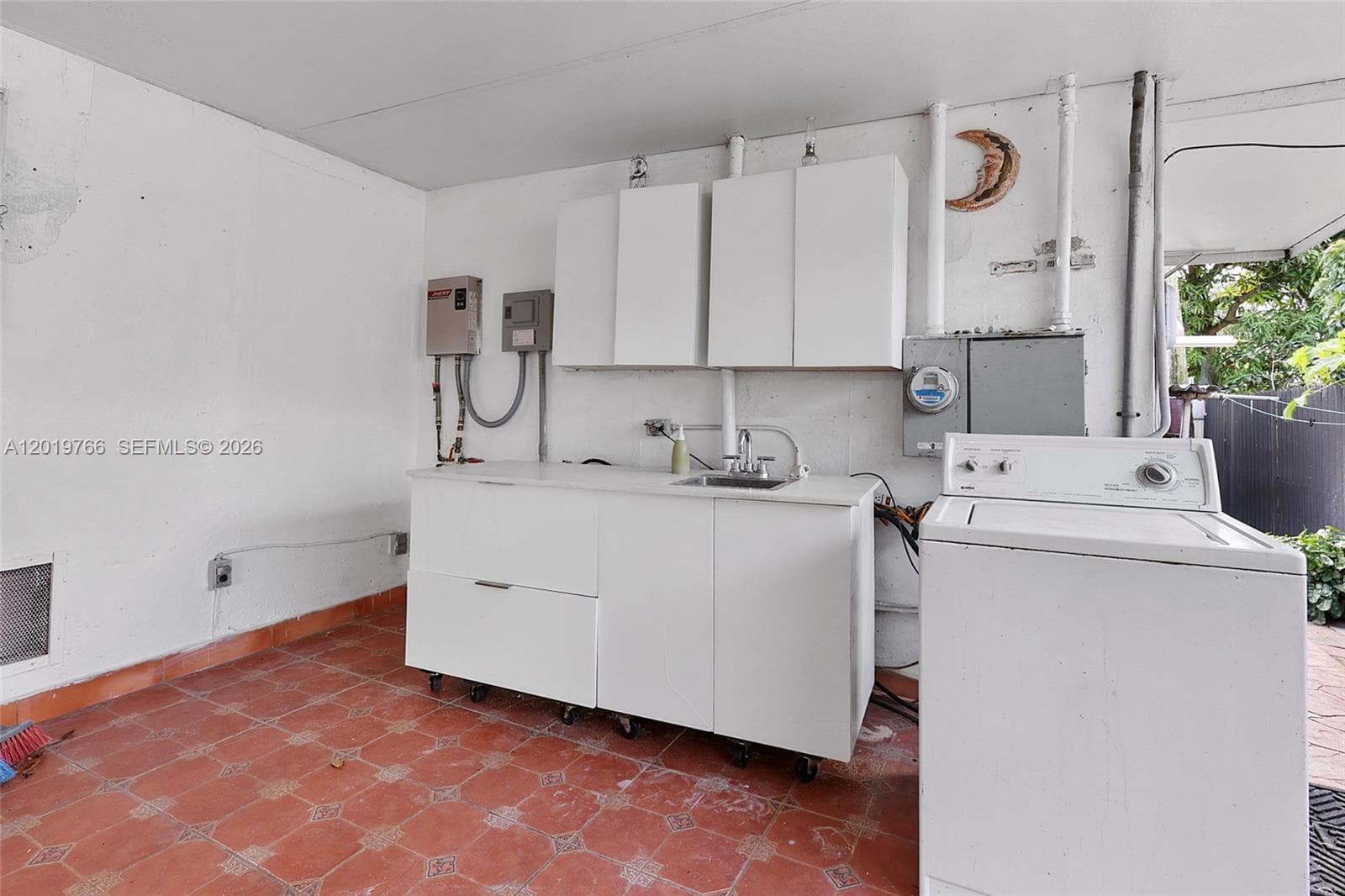 450 NW 40th ct, Miami FL 33126 — 18