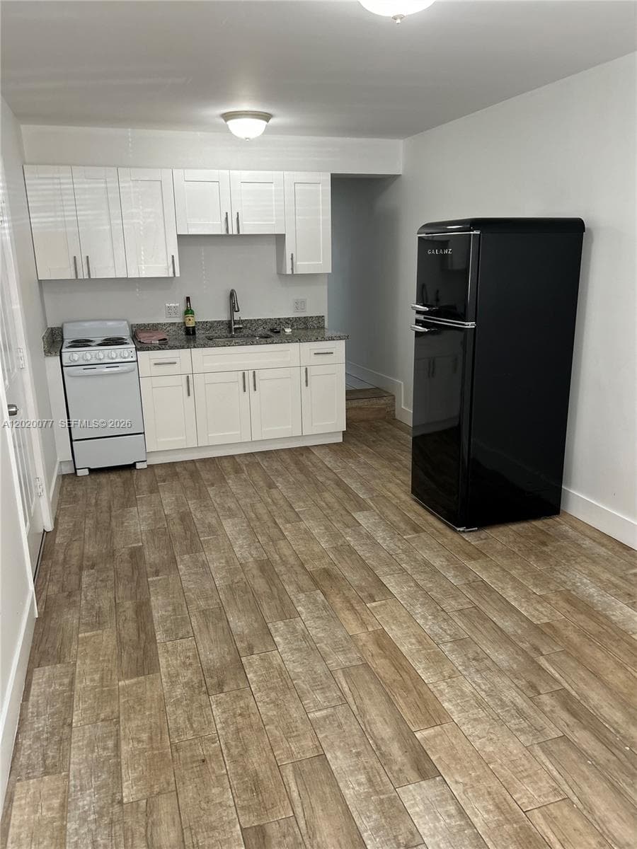 3271 NW 18th Ter, Miami FL 33125 — 32