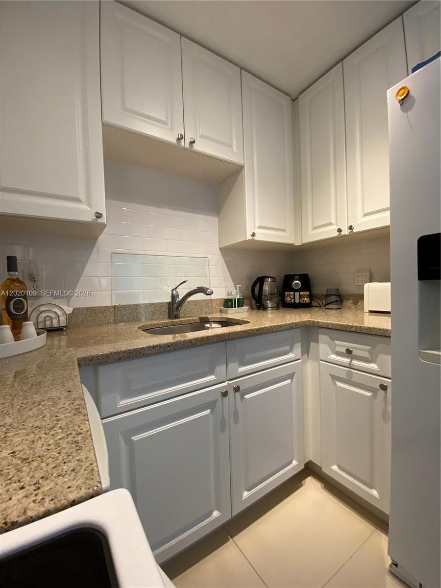 5050 NW 7th St # 312, Miami FL 33126 — 2
