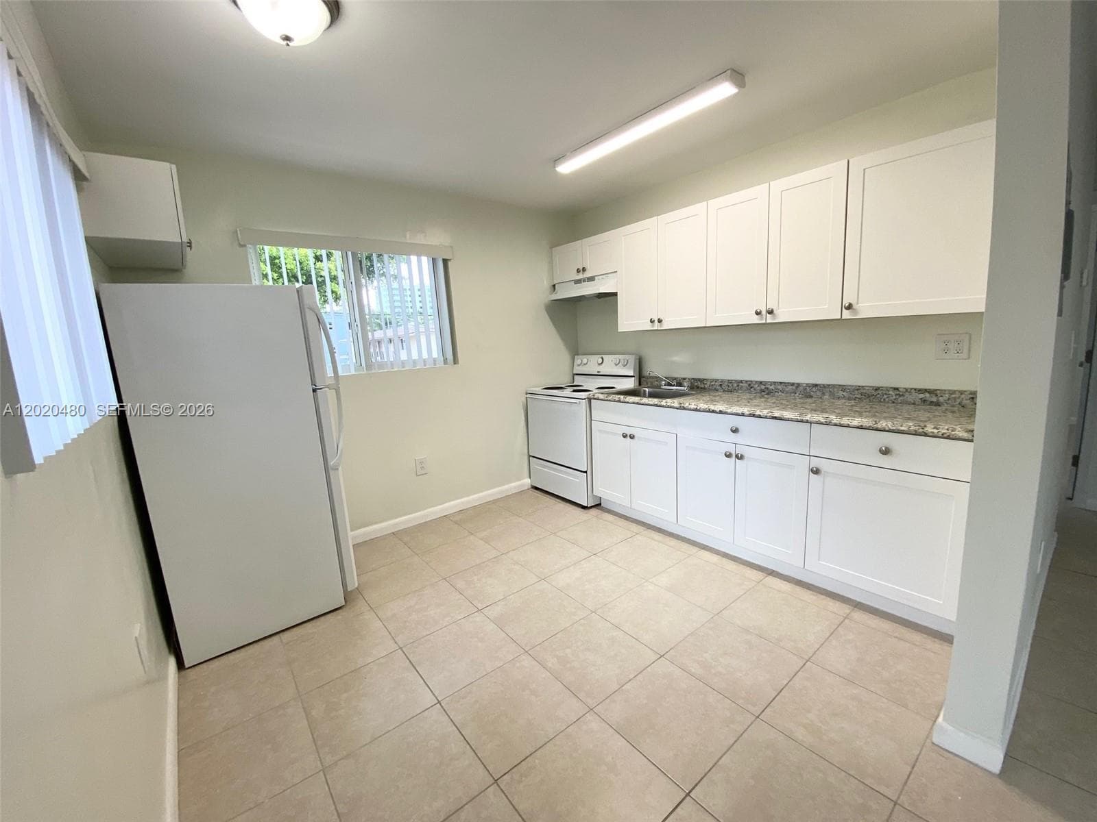 1121 NW 4  ST, Miami FL 33128 — 6