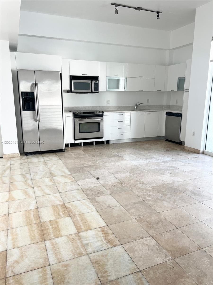 133 NE 2 AV # 710, Miami FL 33132 — 3