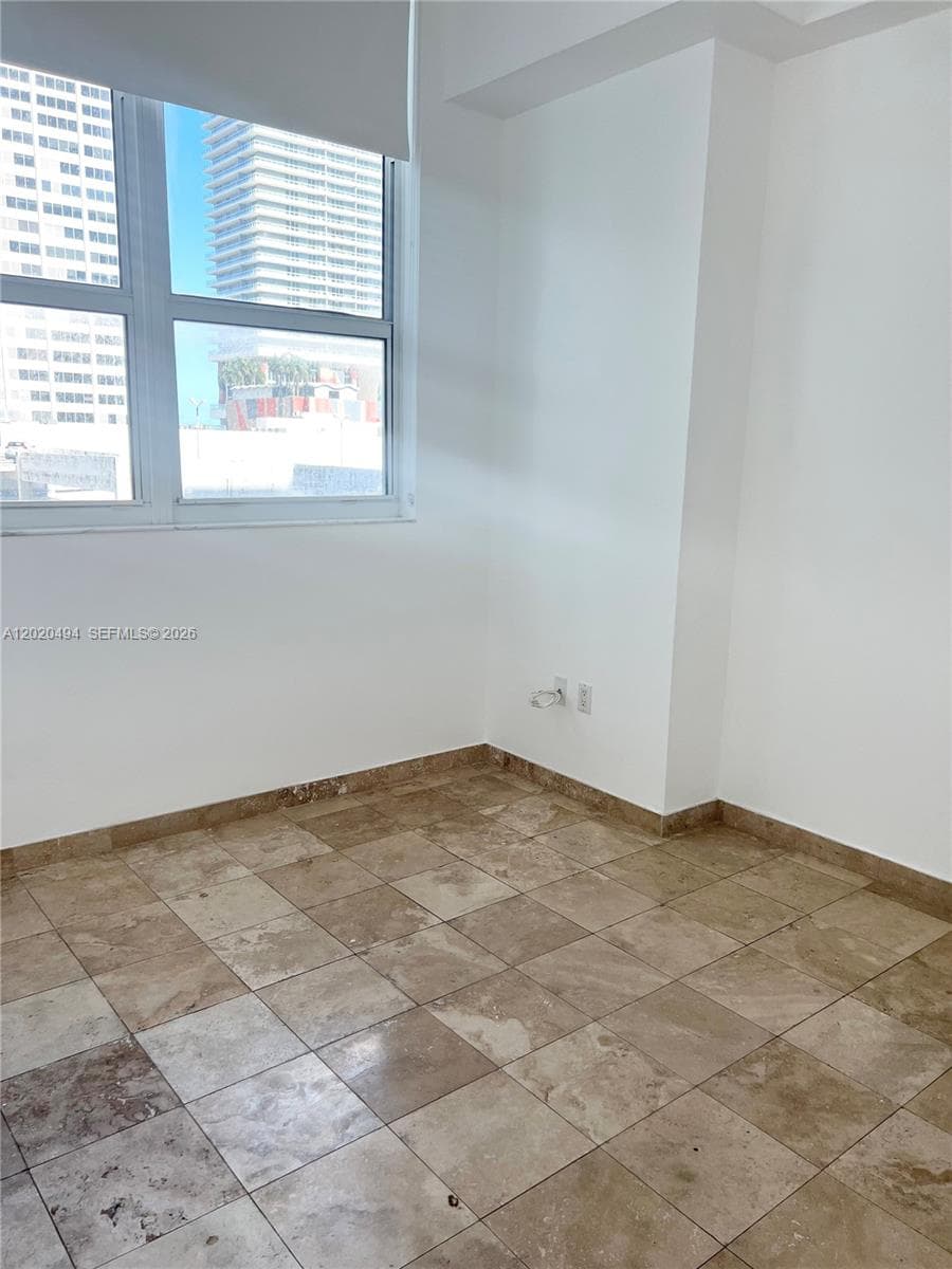 133 NE 2 AV # 710, Miami FL 33132 — 9