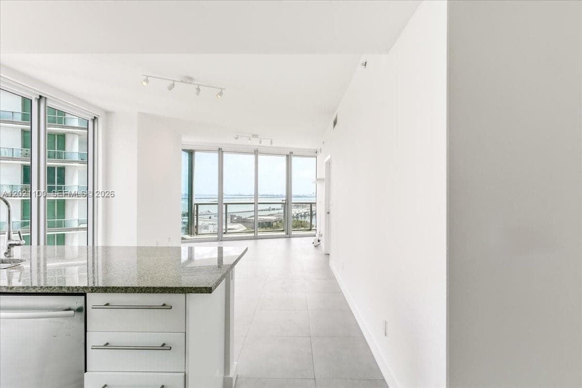 888 Biscayne Blvd # 2212, Miami FL 33132 — 3