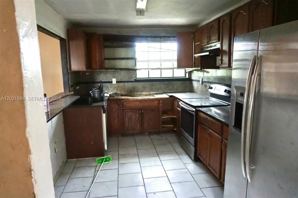 1667 NW 67th St, Miami FL 33147 — 5