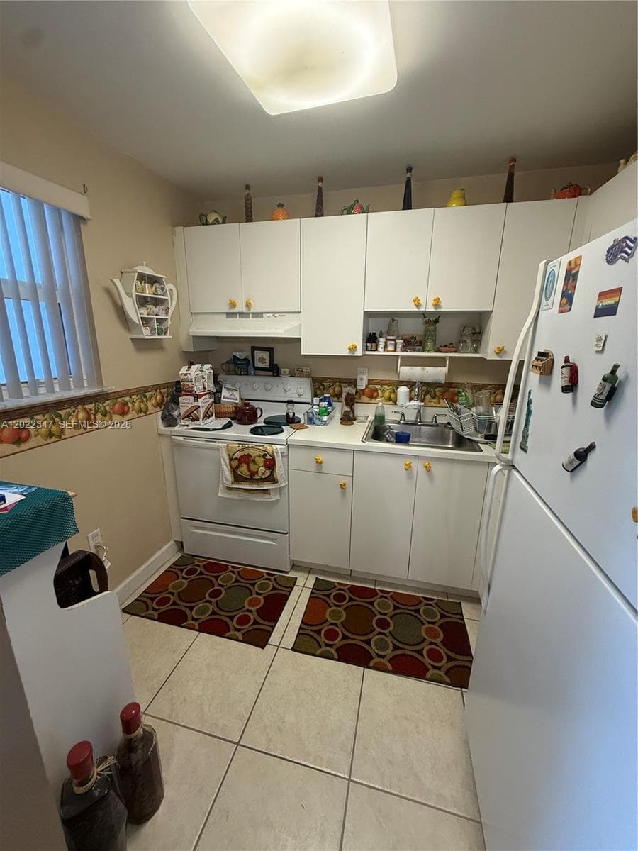 1725 W 60th St # F322, Hialeah FL 33012 — 4