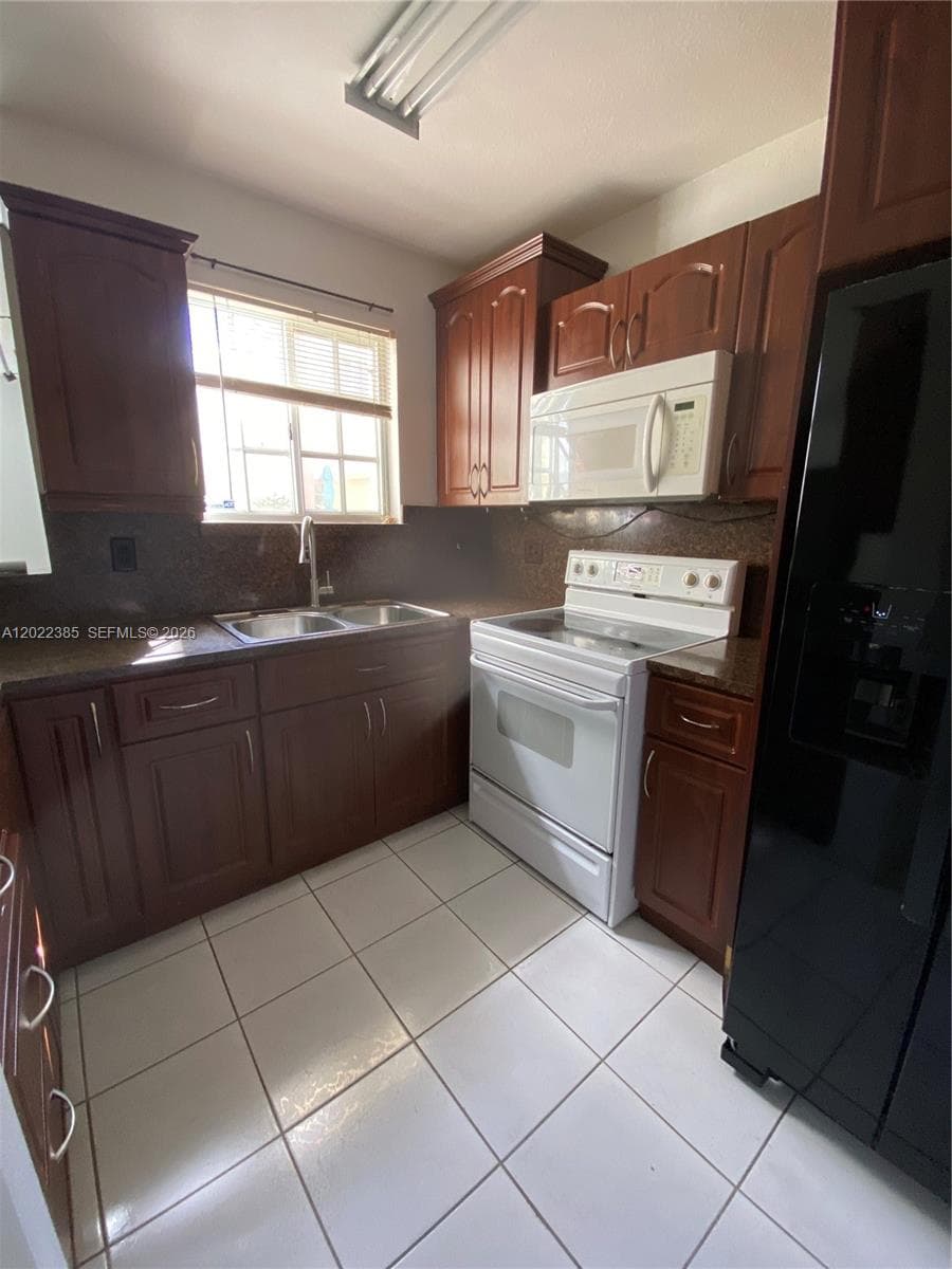 6763 NW 182nd St # 105, Hialeah FL 33015 — 7