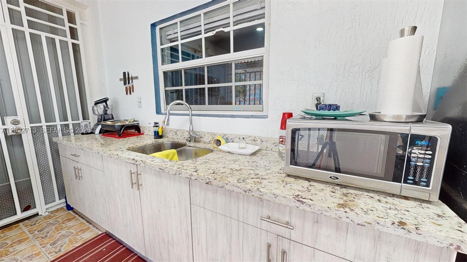 357 W 44th St, Hialeah FL 33012 — 59