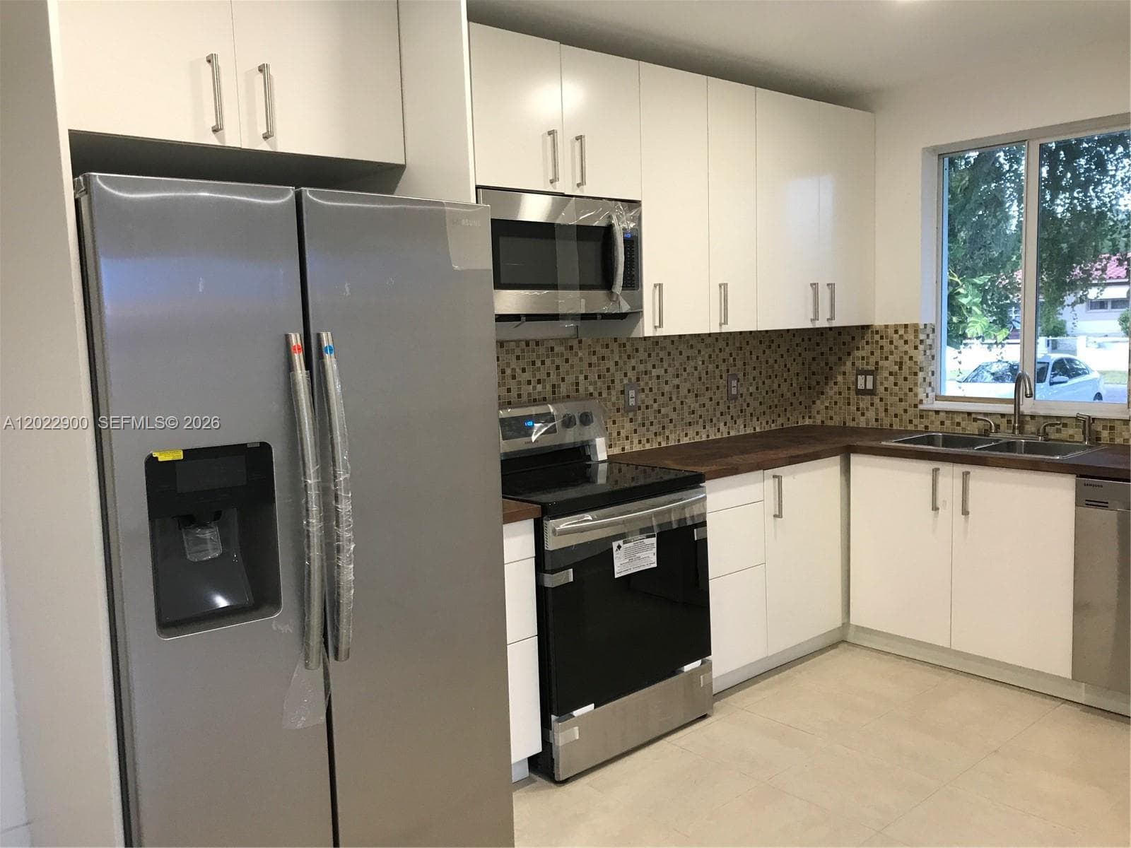 1456 NE 147 St # 0, North Miami Beach FL 33161 — 2