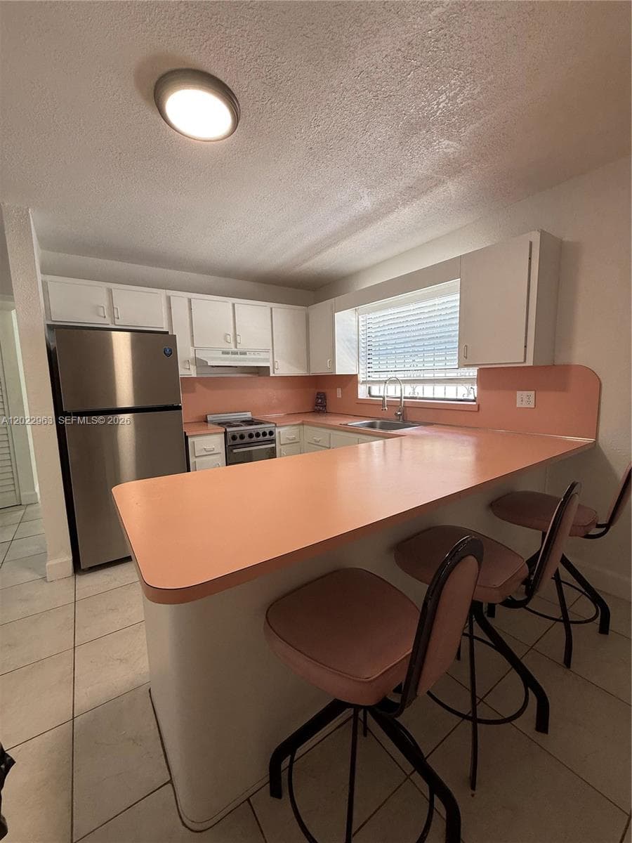 1046 NW 33rd Ave, Miami FL 33125 — 13