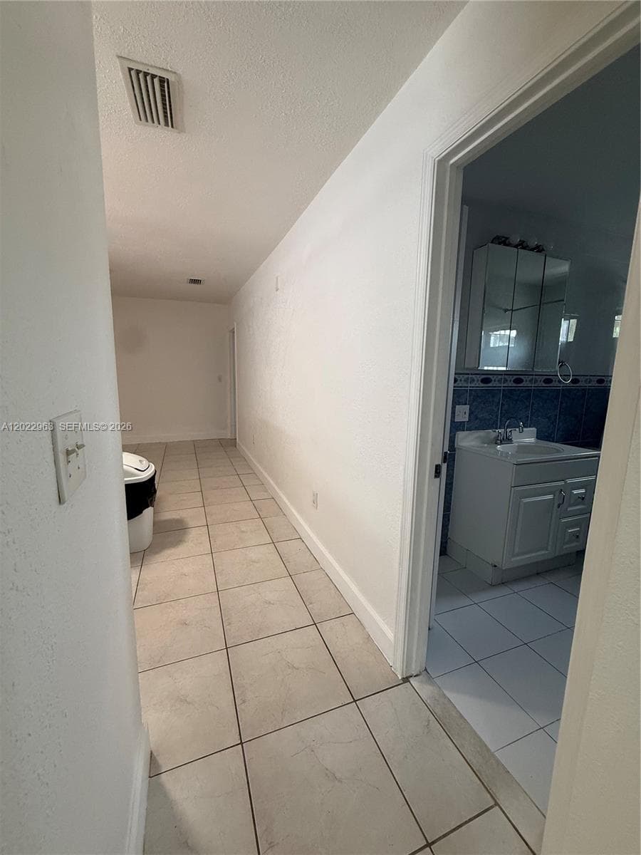 1046 NW 33rd Ave, Miami FL 33125 — 17