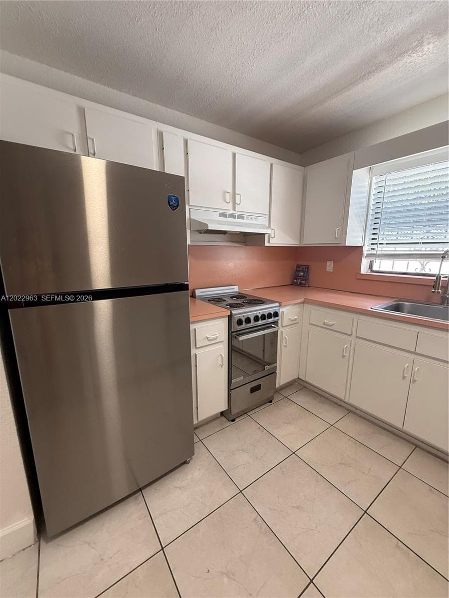1046 NW 33rd Ave, Miami FL 33125 — 12