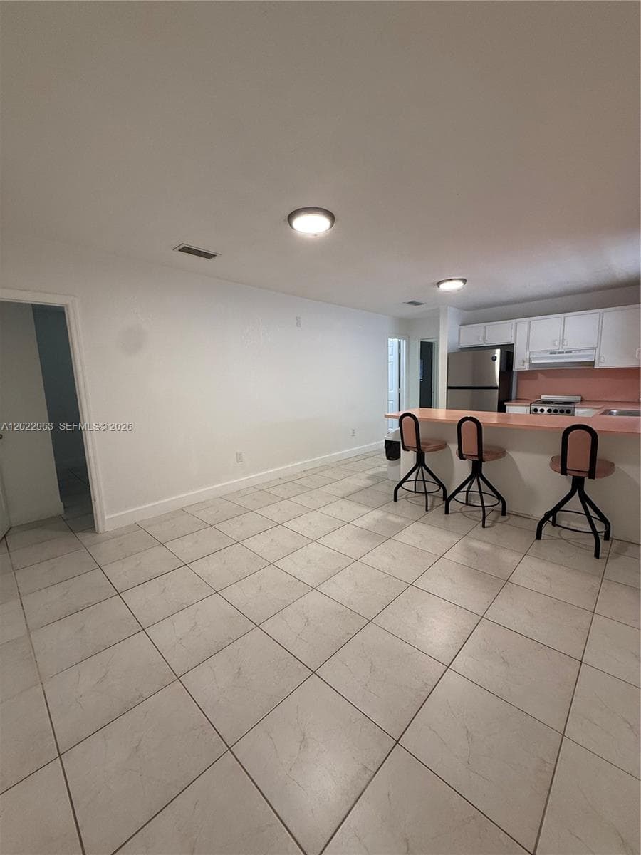 1046 NW 33rd Ave, Miami FL 33125 — 5