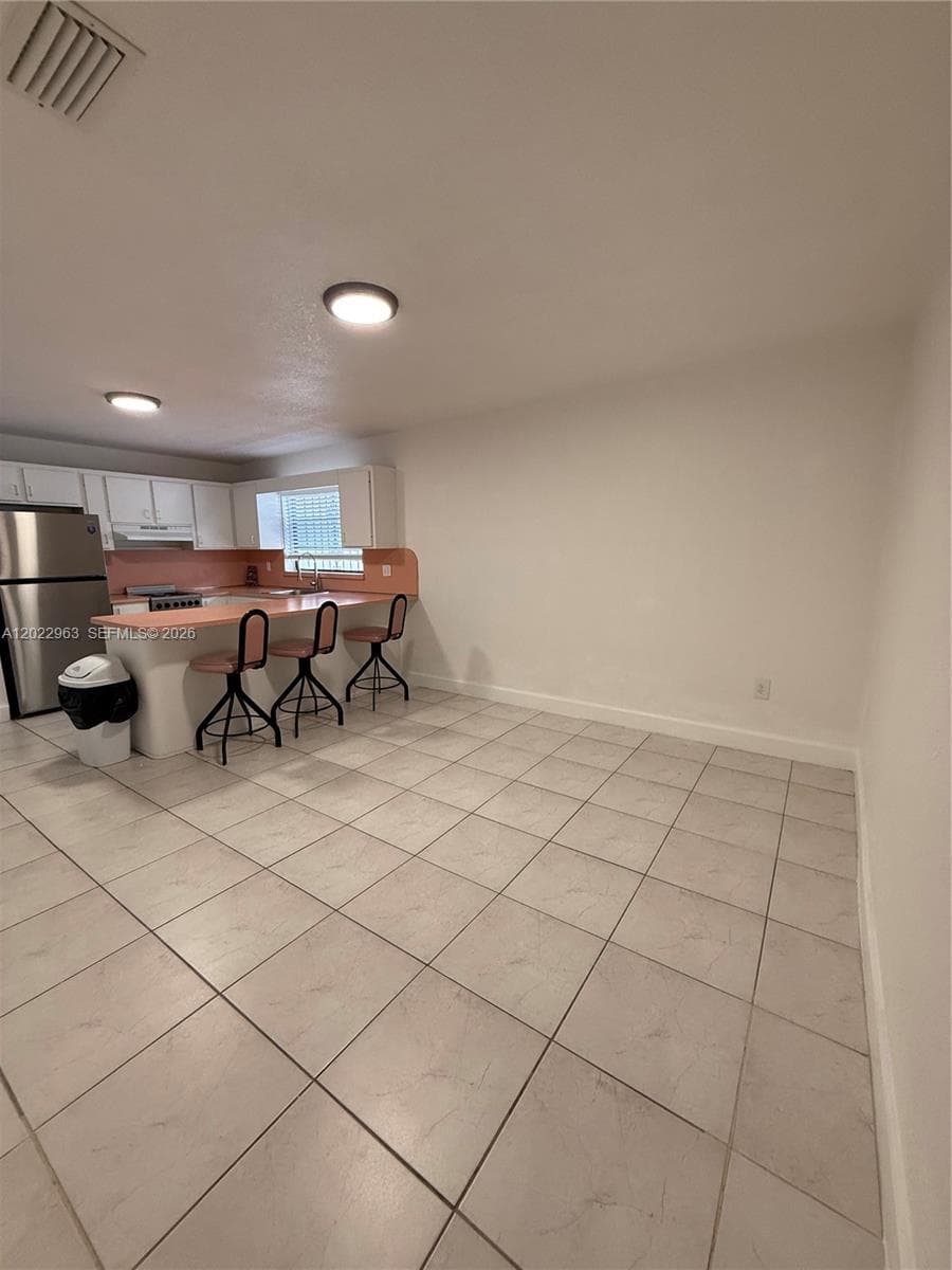 1046 NW 33rd Ave, Miami FL 33125 — 9