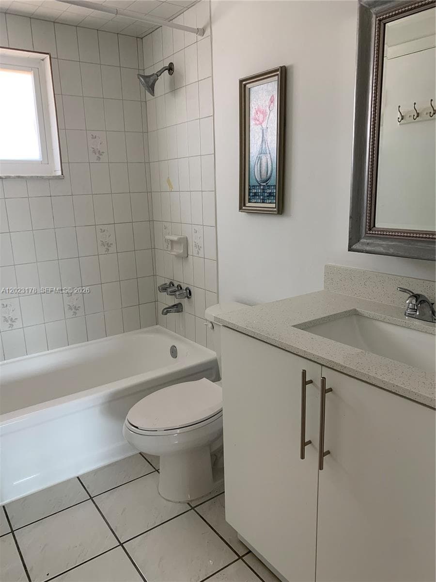 7703 Camino Real # 405, Miami FL 33143 — 5