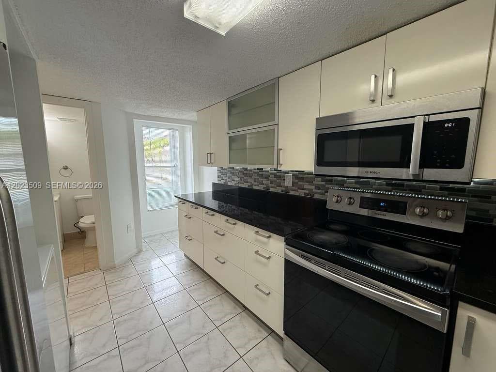 1137 NW 123rd Court # 610, Miami FL 33182 — 4