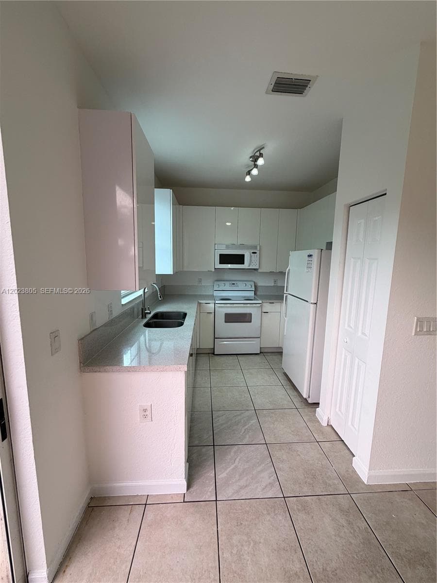 607 NE 21st Ter, Homestead FL 33033 — 5