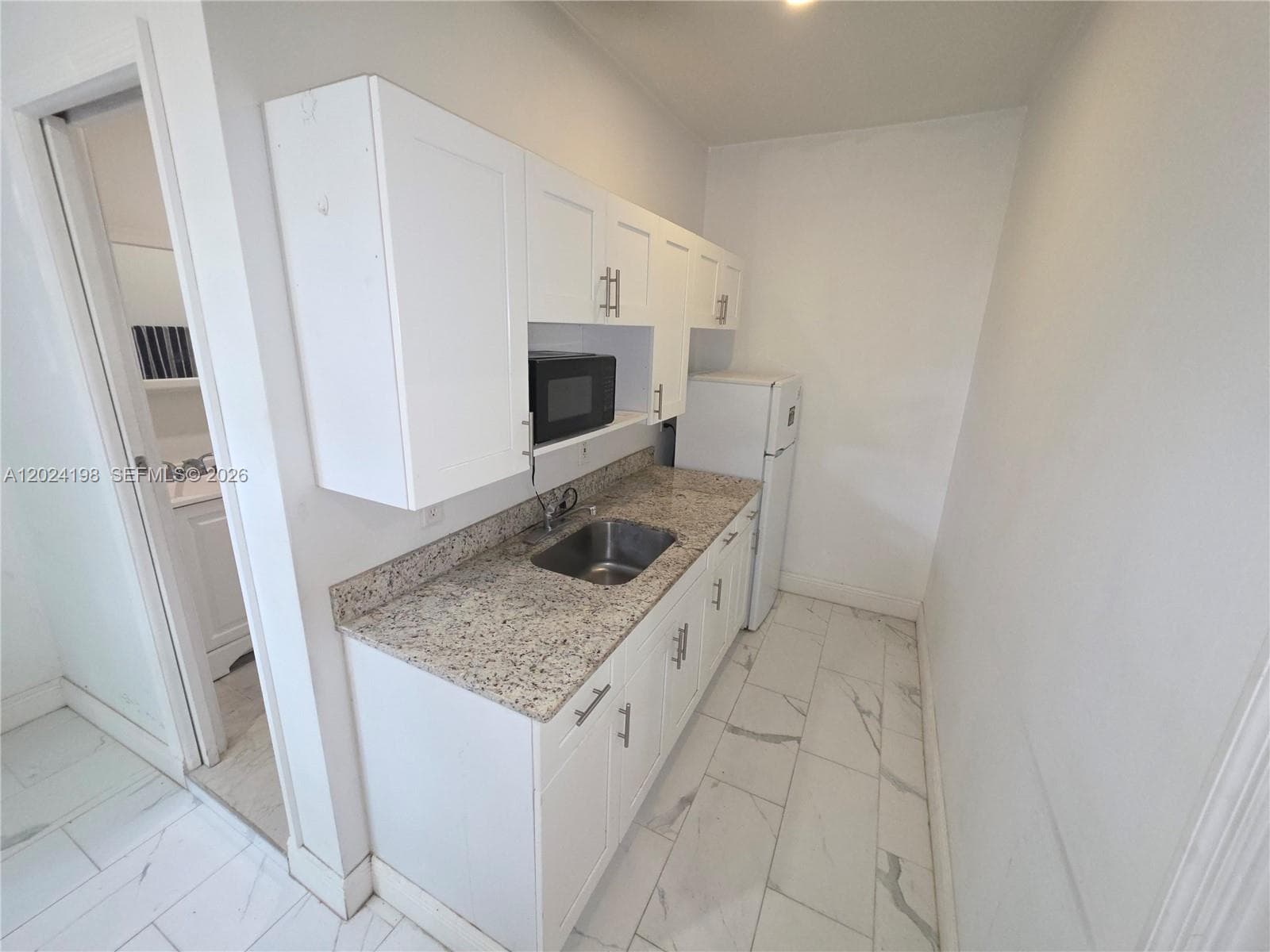 651 E 48th St, Hialeah FL 33013 — 38