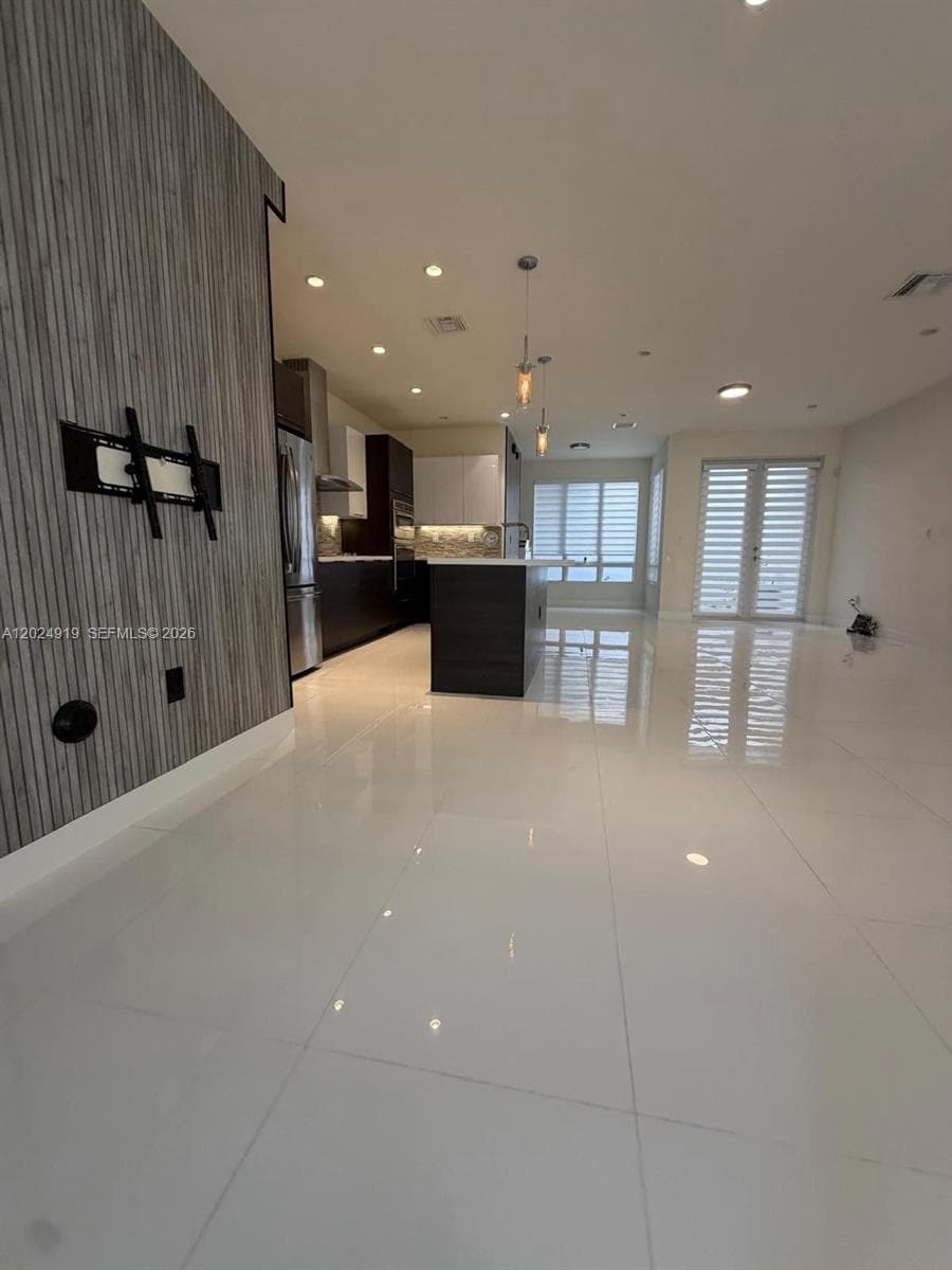 6311 NW 103rd Psge # 6311, Doral FL 33178 — 5