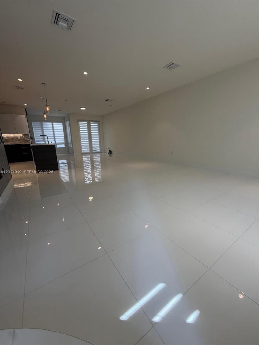 6311 NW 103rd Psge # 6311, Doral FL 33178 — 4