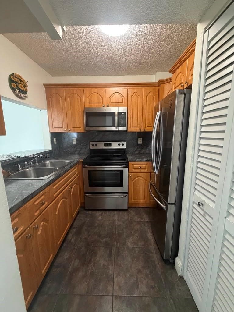 8185 NW 7th St # 218, Miami FL 33126 — 8