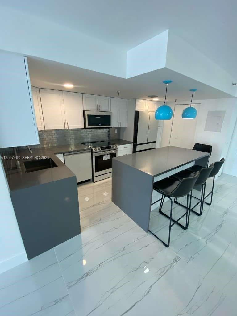 7832 Collins Ave # 201, Miami Beach FL 33141 — 6