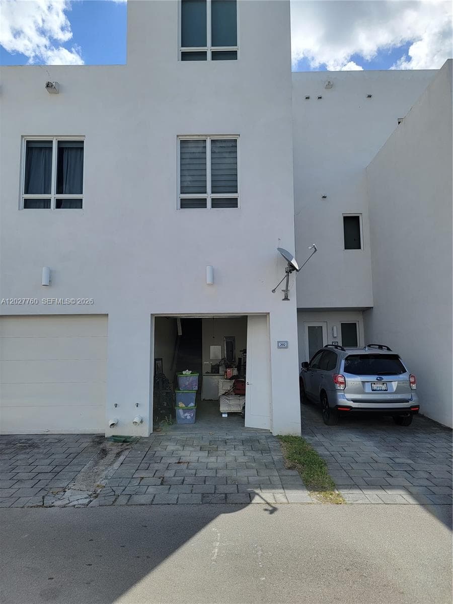 6310 NW 103rd Pl # 202, Doral FL 33178 — 3