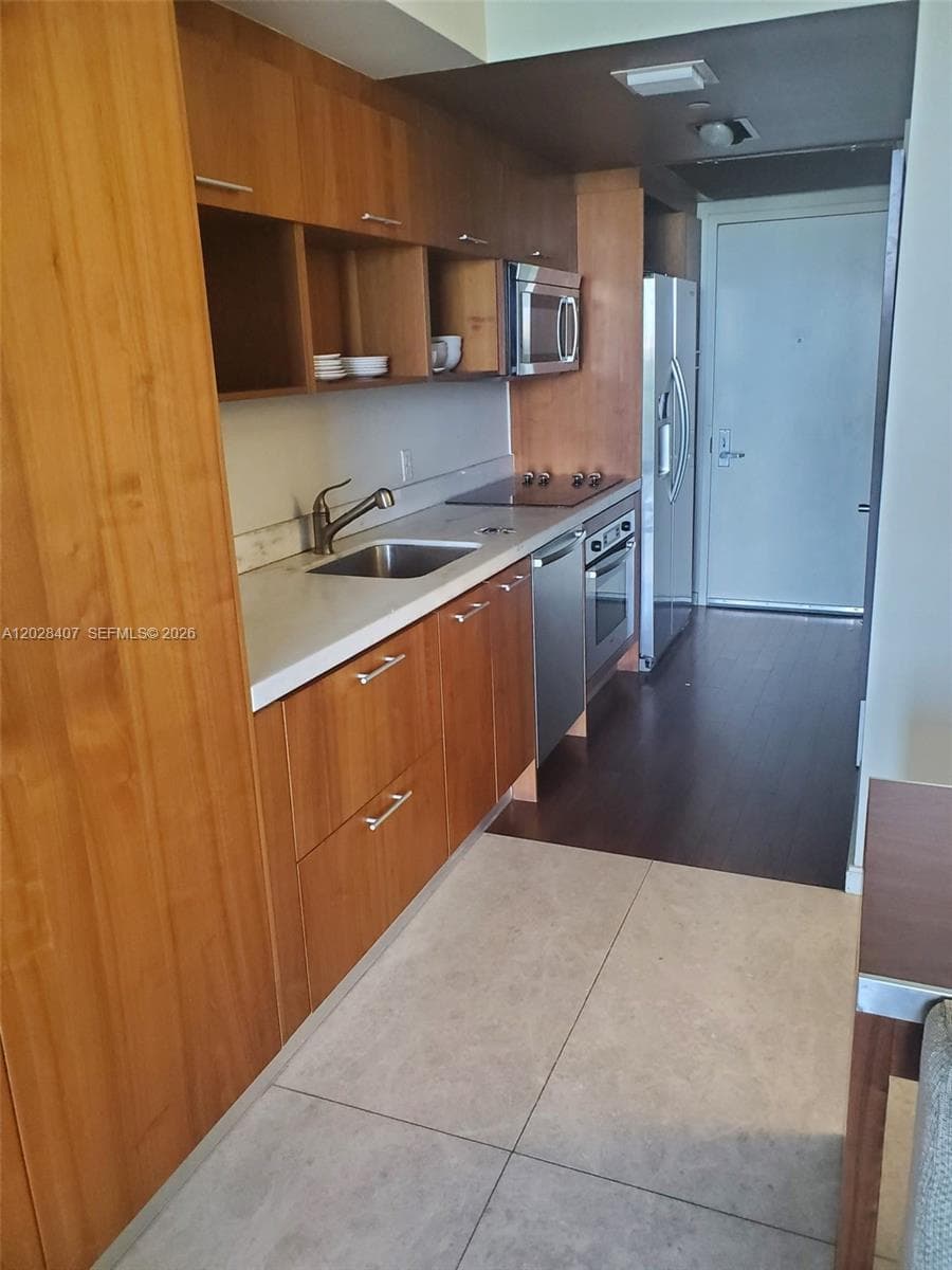 50 Biscayne Blvd # 703, Miami FL 33132 — 10