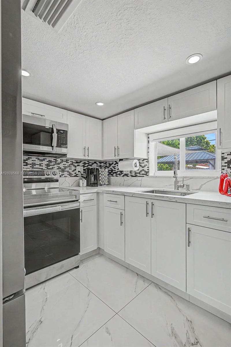 10345 NW 35th Ct, Miami FL 33147 — 9