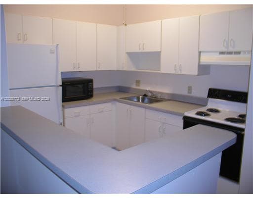 9729 Hammocks Blvd # 206E, Miami FL 33196 — 2