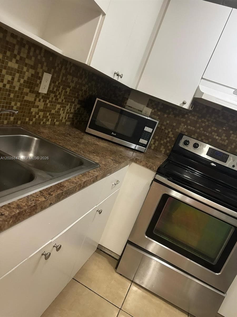 6675 W 4th Ave # 408, Hialeah FL 33012 — 13