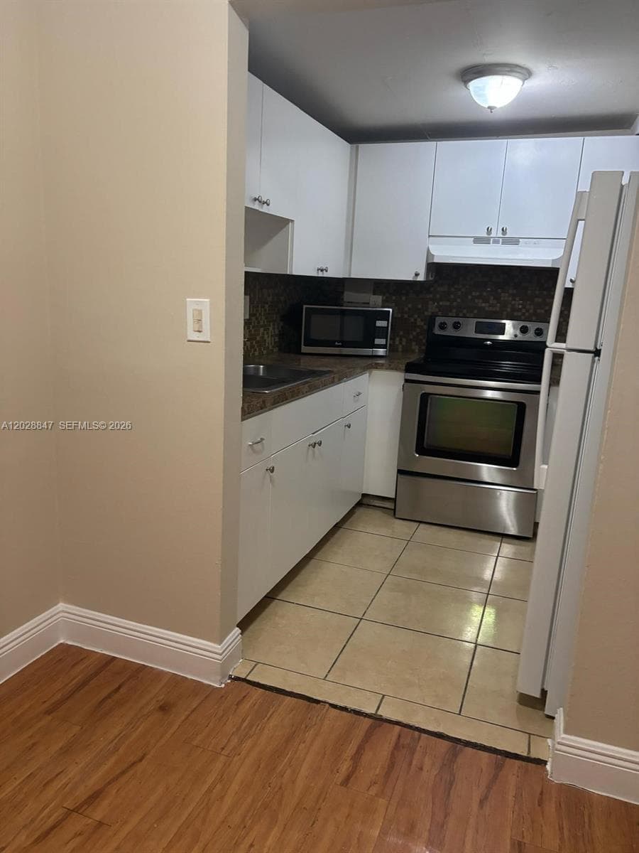 6675 W 4th Ave # 408, Hialeah FL 33012 — 14