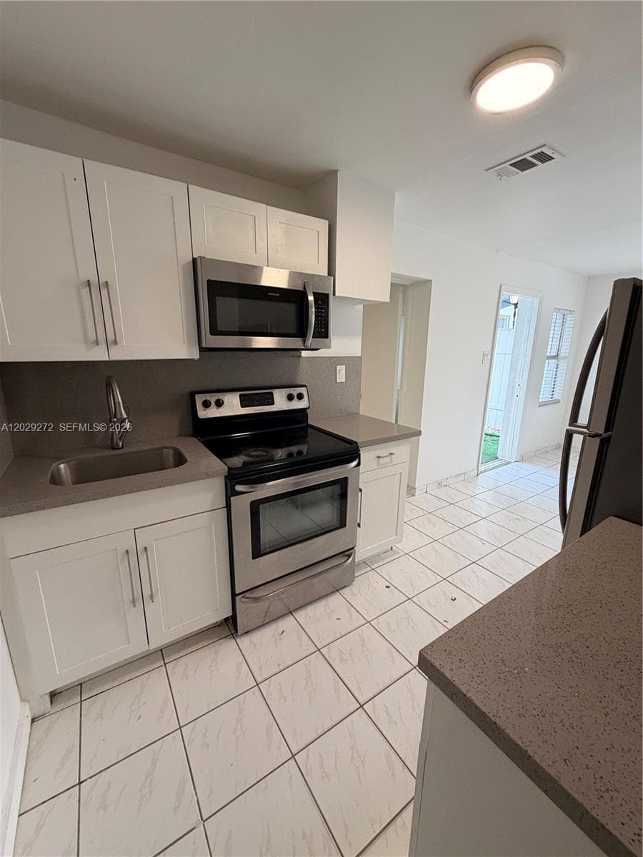 2420 NW 31st St # 3, Miami FL 33142 — 5