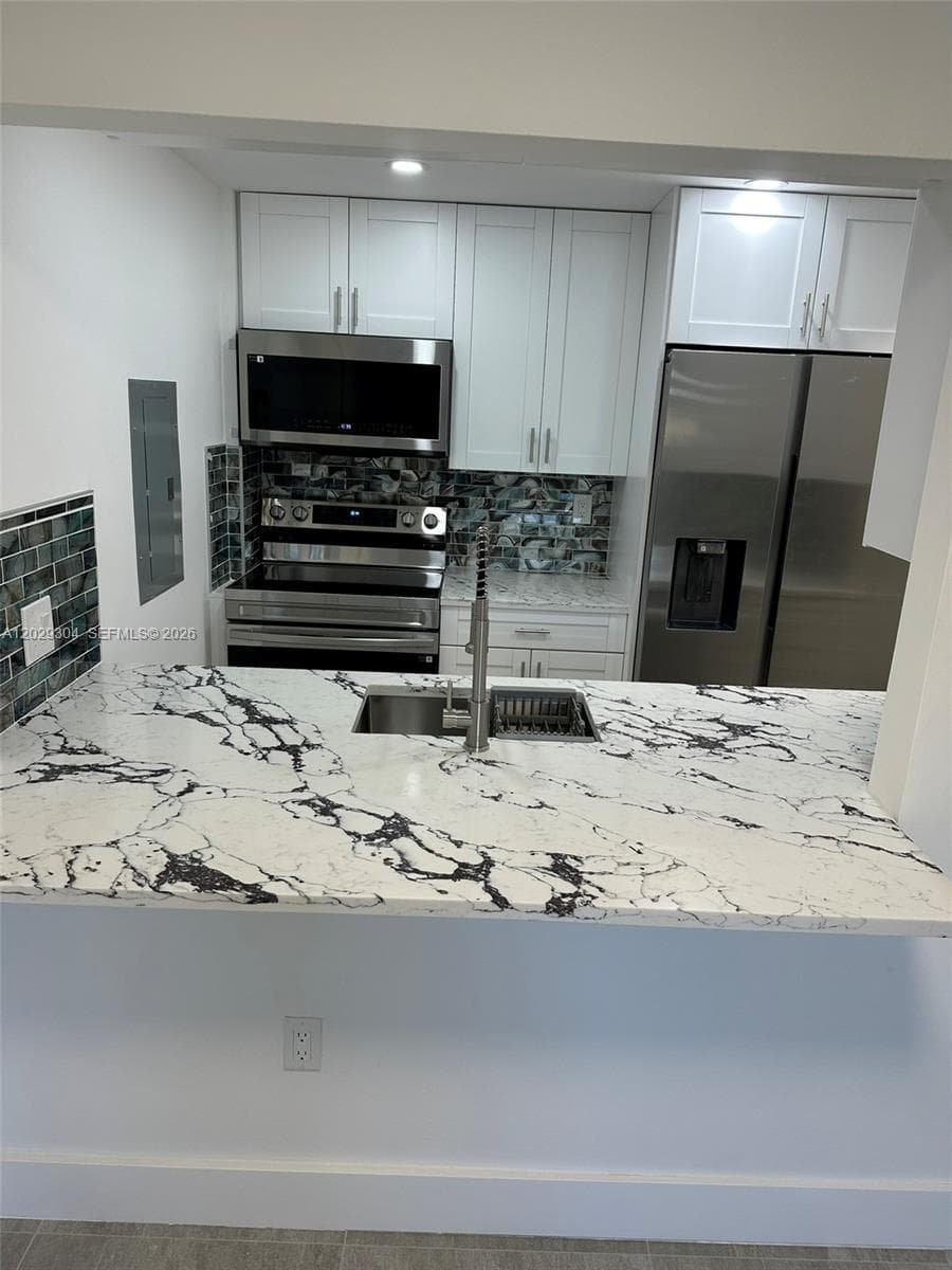 5280 NW 7th St # 306, Miami FL 33126 — 2