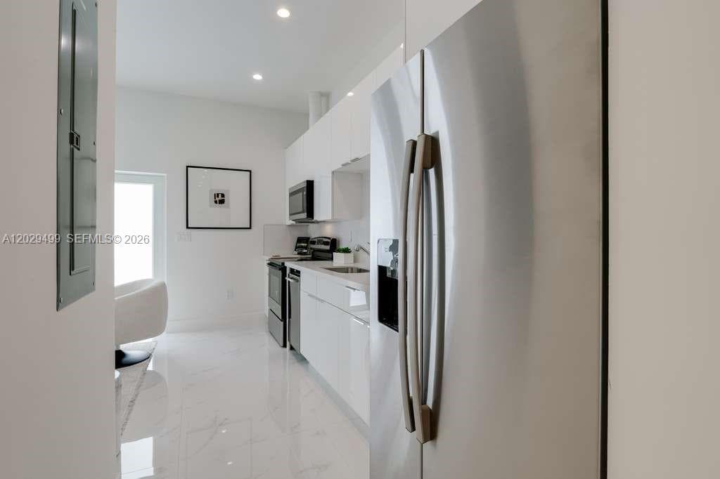 2938 NW 27th St # 2938, Miami FL 33142 — 3