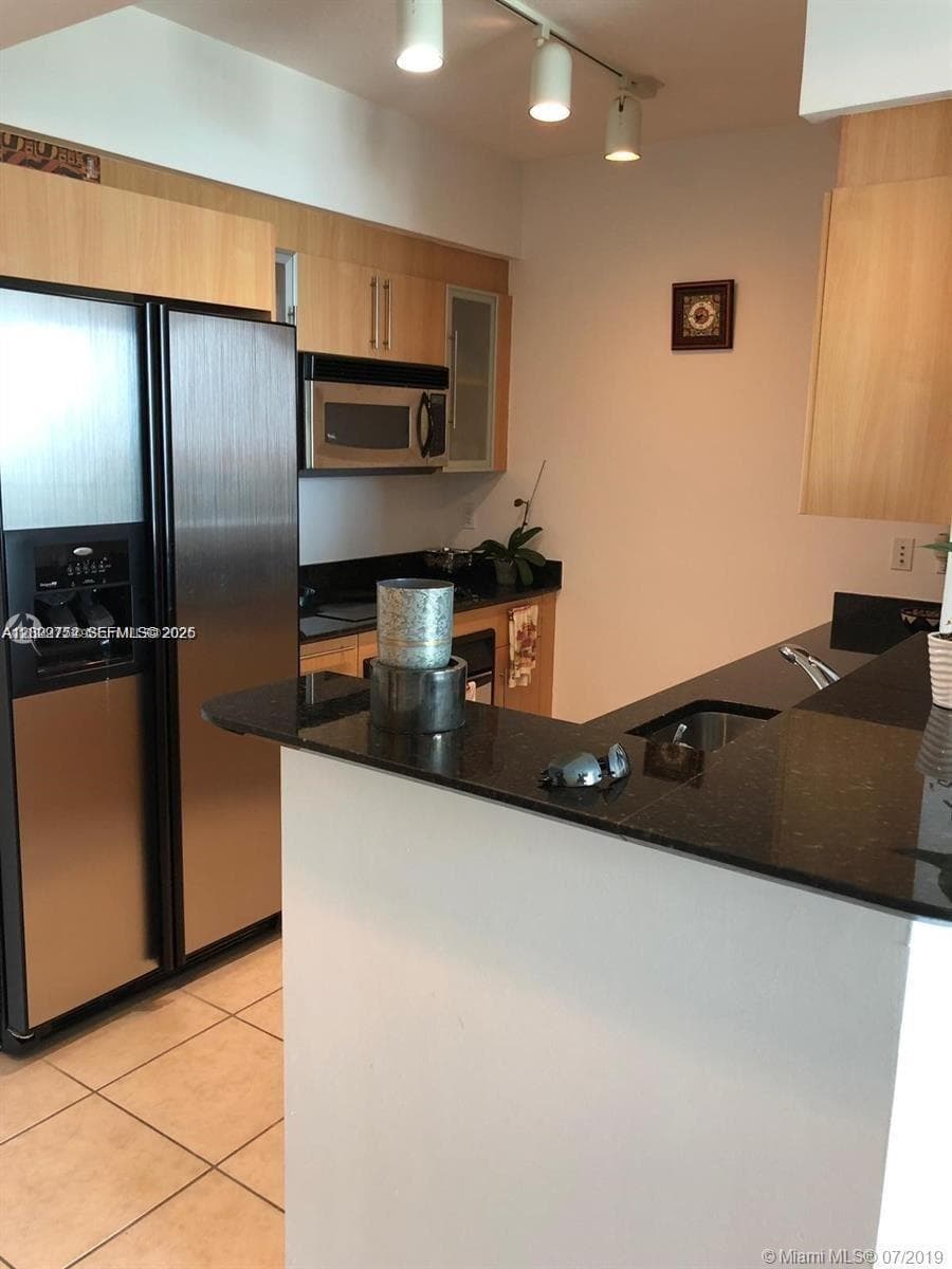 325 S Biscayne Blvd # 1716, Miami FL 33131 — 4