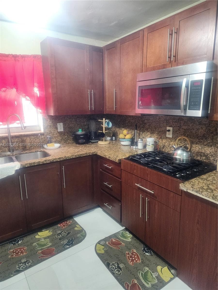 2130 NW 92nd St, Miami FL 33147 — 3