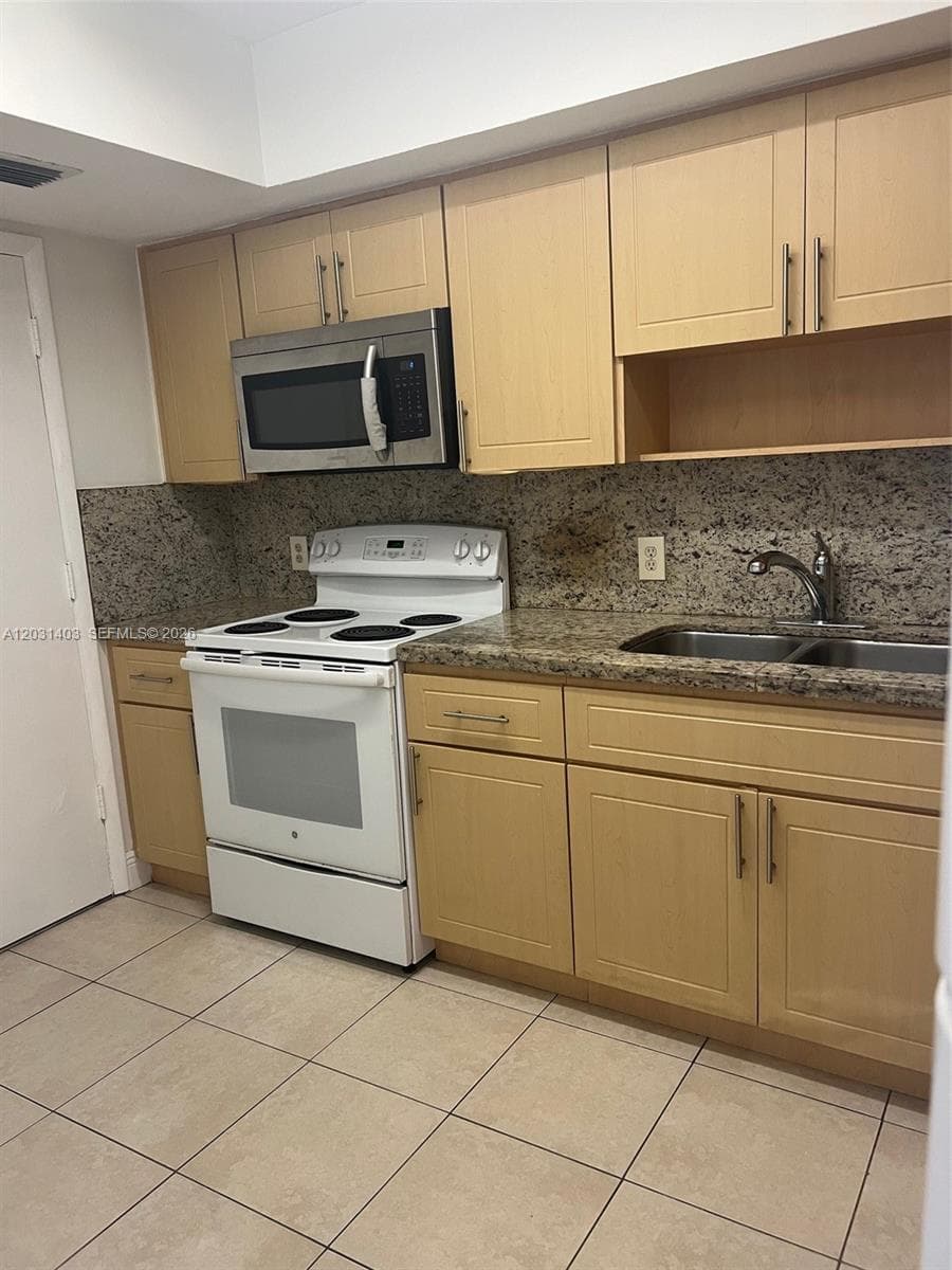 16801 NE 14th Ave # 310, Miami FL 33162 — 3